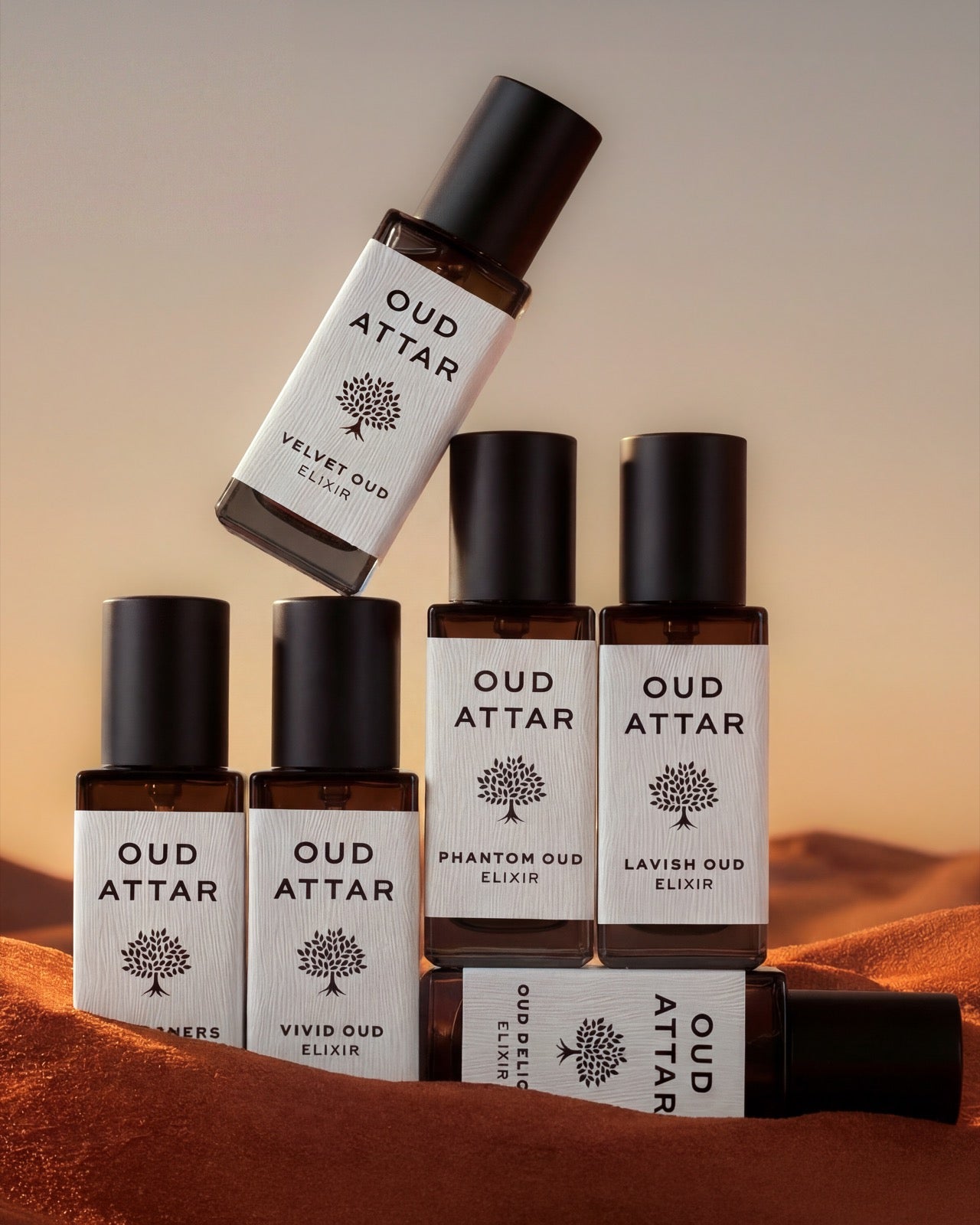 15ml elixir bottles nestled in golden sand