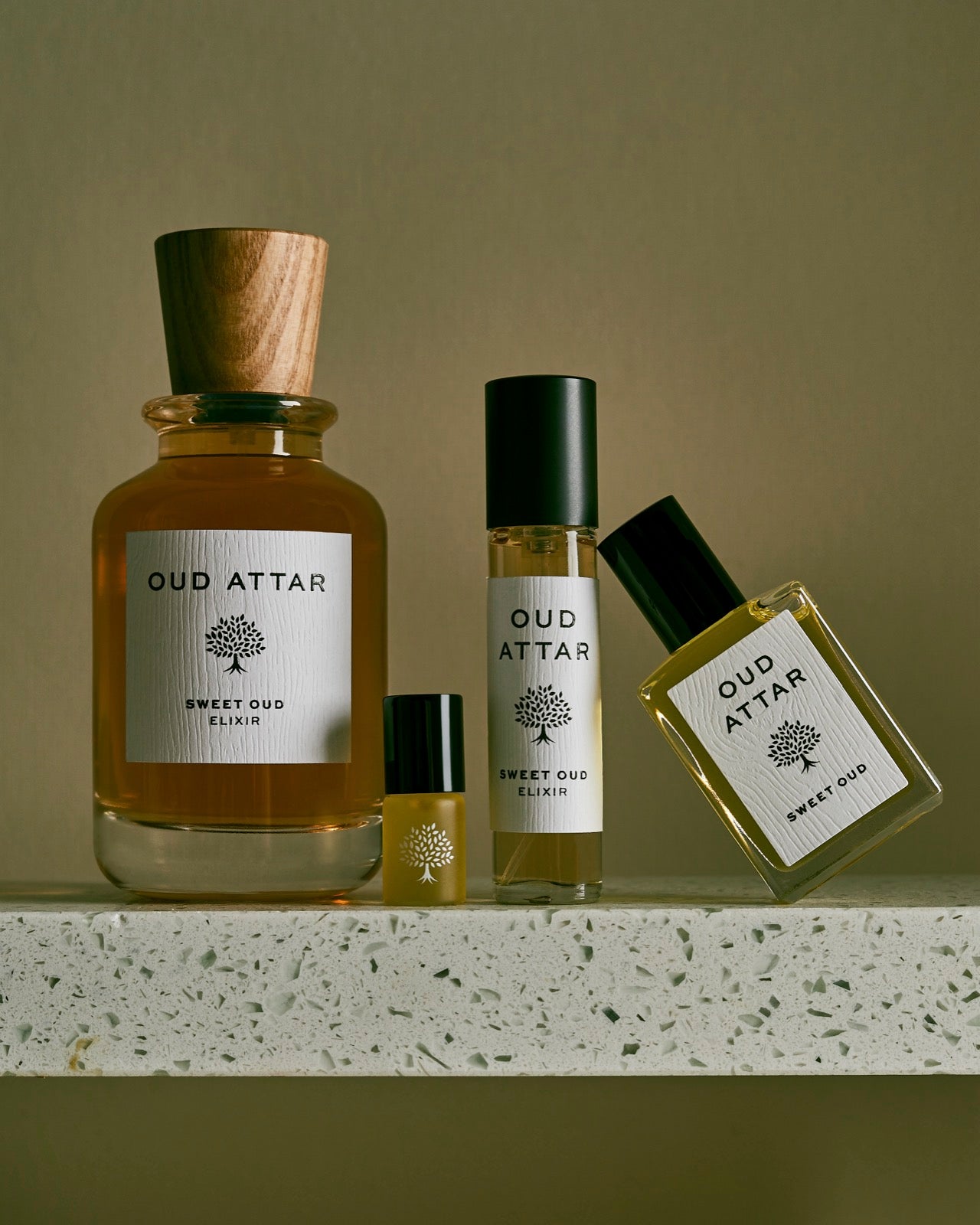 Sweet Oud bottle sizes lined up side by side