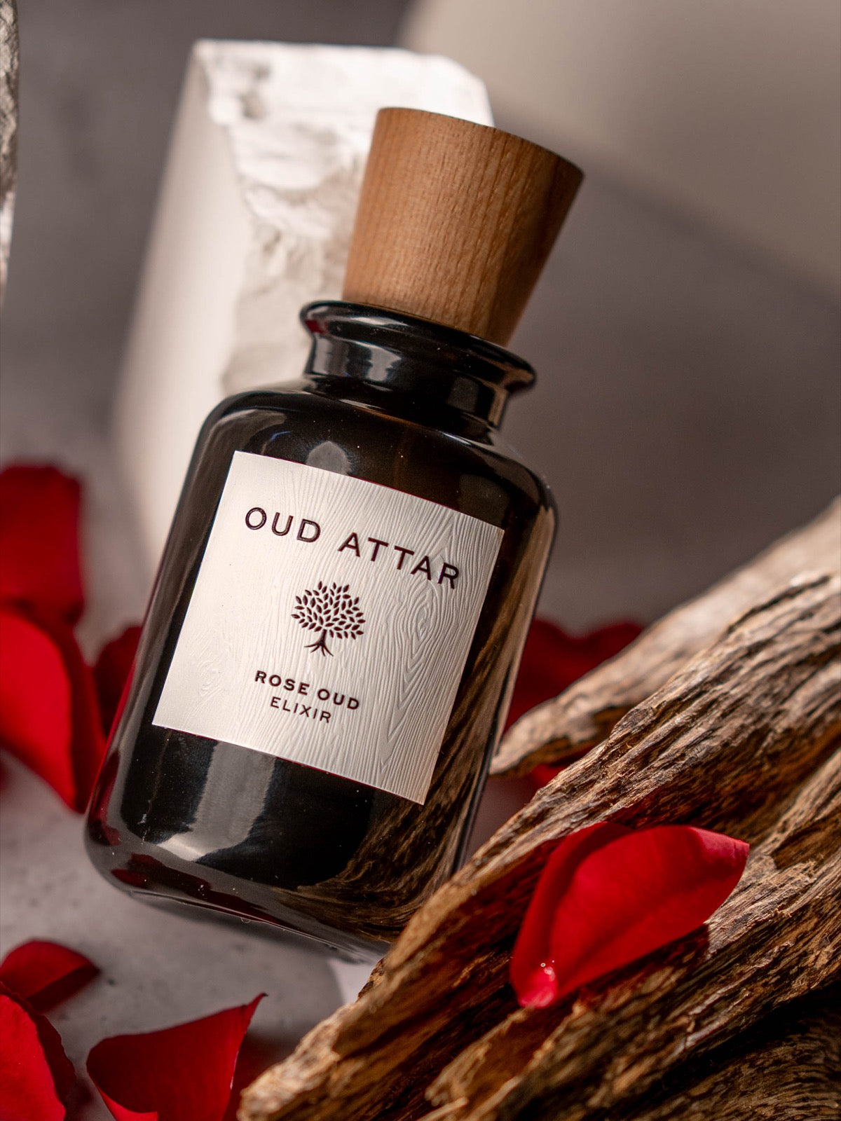 Rose Oud elixir with rose petals and agarwood